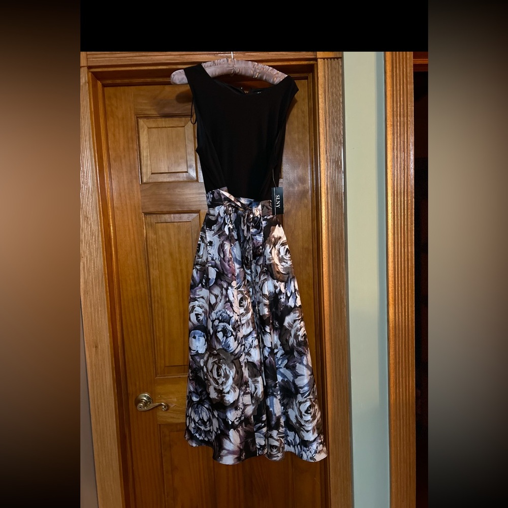 Black dress with flower bottom never worn